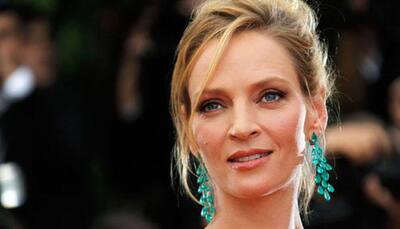 I am 'madly in love' with my children: Uma Thurman