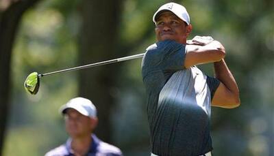 Tiger Woods makes charge as Ryo Ishikawa clings to PGA lead