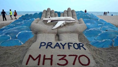 MH370 search: Missing plane draws eyes to land of molten lava, killer sharks
