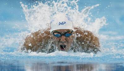 Michael Phelps answers Chad Le Clos with 100m butterfly victory