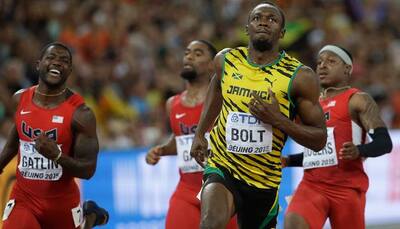 Sprint legend Usain Bolt trumps Justin Gatlin to retain world 100m title​ at Beijing