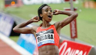 World championships: Genzebe Dibaba dominates to win 1,500 metres gold