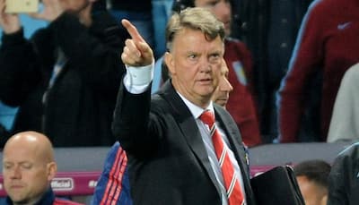 Louis van Gaal praises Wayne Rooney's mentality as Manchester United secure CL place