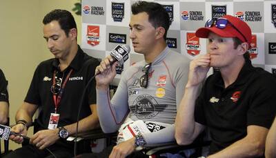 IndyCar drivers back at work with heavy hearts