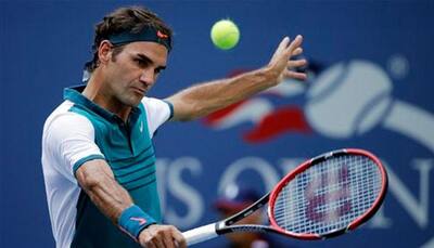 US Open: Roger Federer eases into second round; others toil in heat