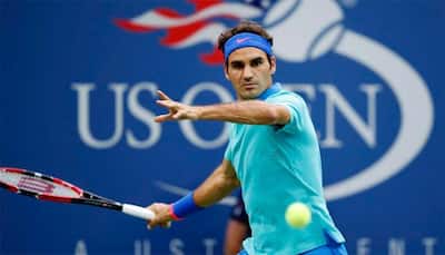 `Superhero` Federer rescues young fan from US Open crowd crush
