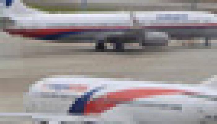 Hackers target Malaysia Airlines, threaten data dump