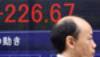 Tokyo shares at 8-year peak, Greek talks loom 