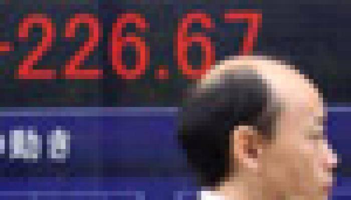 Tokyo shares at 8-year peak, Greek talks loom 