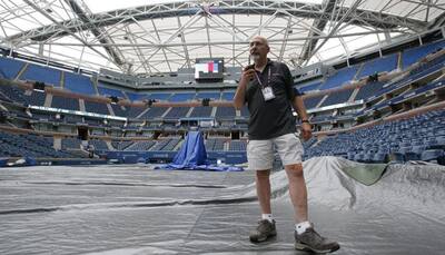 Rain delays Serena Williams' quest for Grand Slam history