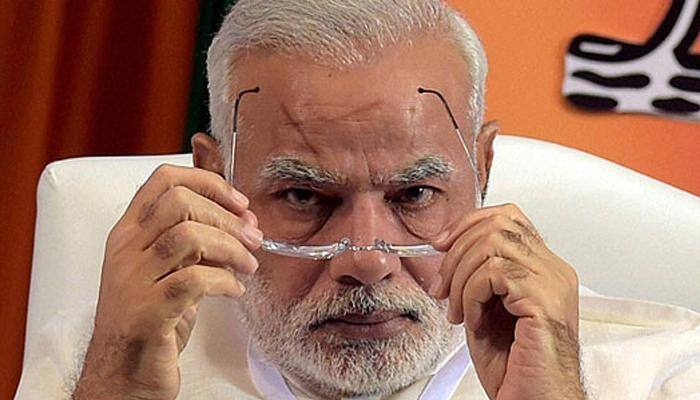 Polls show Modi in tough battle to win Bihar election