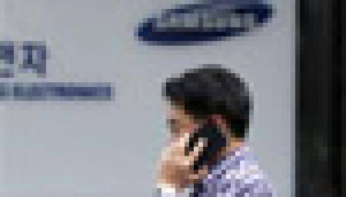 Shareholders back Samsung's key $8 billion merger plan in close vote