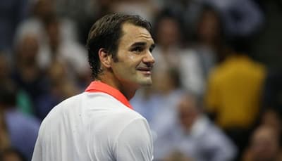 Beaten Roger Federer shrugs off talk of retirement