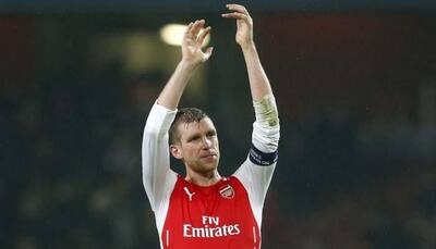 Arsenal's Per Mertesacker escapes unhurt in car accident