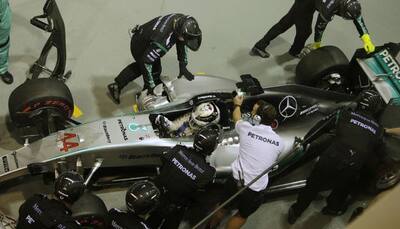 Lewis Hamilton's lead cut after Singapore retirement 