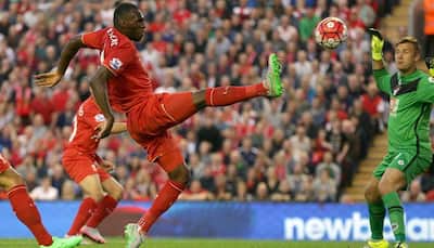Liverpool's Christian Benteke to undergo scan after hamstring injury