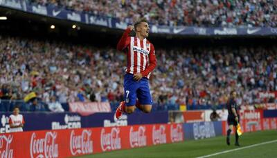 Antoine Griezmann double fires Atletico Madrid top of La Liga