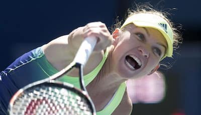 Top seed Simona Halep advances in WTA Guangzhou Open
