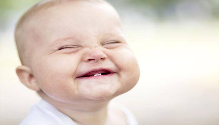 Here`s how babies are actively scheming to make you smile