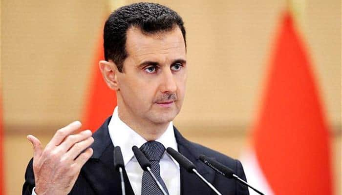 Syria`s Assad makes rare public appearance for Eid prayers