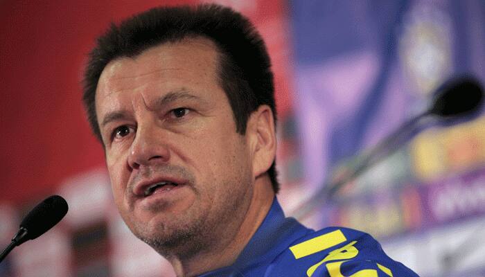 Brazil coach Dunga threatens to sue Romario