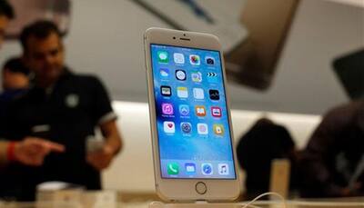 New iPhones hit stores, record sales expected in first weekend