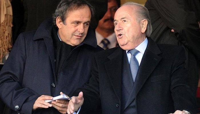 FIFA chief Sepp Blatter faces criminal probe, cloud over Michel Platini