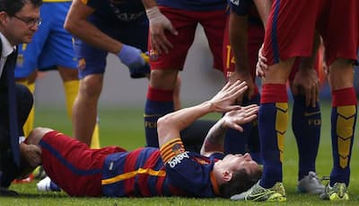 Lionel Messi faces two-month injury layoff, Real Madrid held by Malaga