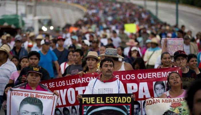 One year on, Mexico pressured for answers on missing students