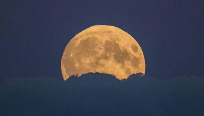 Rare Supermoon eclipse: Amazing pictures of the 'blood moon' from around the world!