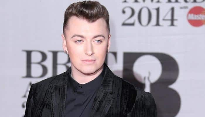 Sam Smith&#039;s `Writing&#039;s On The Wall` becomes first Bond song to hit No.1 in UK