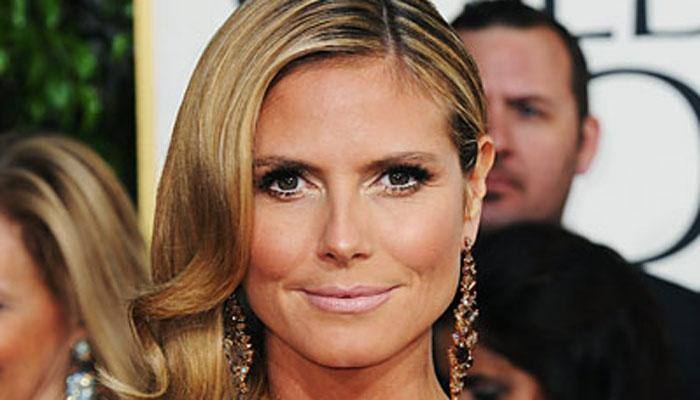Watch: Heidi Klum's all plastered up for Halloween!