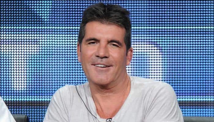 Simon Cowell apologises after swearing on &#039;The X Factor UK&#039;
