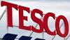 British supermarket Tesco reports £365 million loss in first half