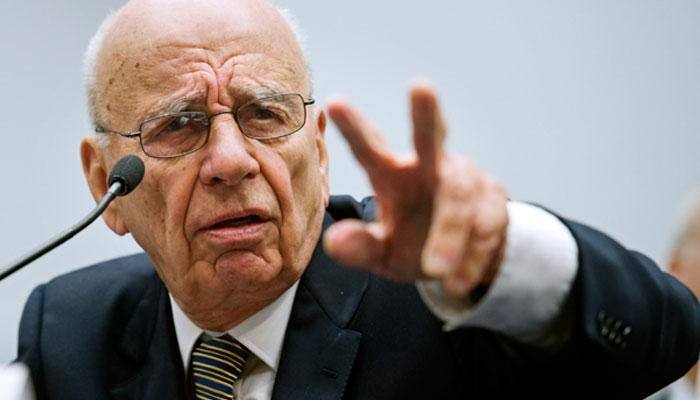 Murdoch says Obama not a 'real black president', apologises
