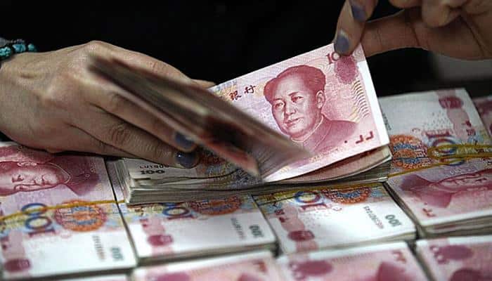 US softens stance on China&#039;s currency