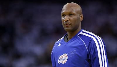 Lamar Odom takes first steps in 'miraculous' recovery