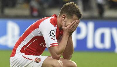 Arsenal's Aaron Ramsey out for three weeks with calf injury