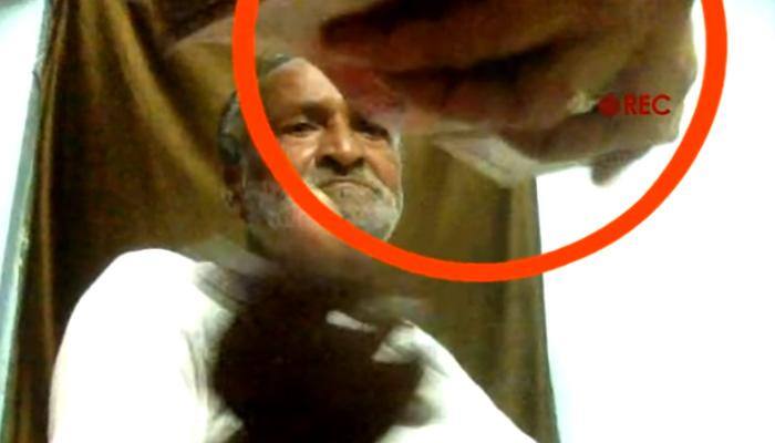 More trouble for Nitish after &#039;Tantrik&#039; clip; JD(U) MLA caught on camera taking bribe