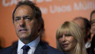 Daniel Scioli leads Argentina vote but may face runoff