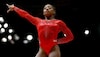 US gymnast becomes first woman to win three straight all-around world titles