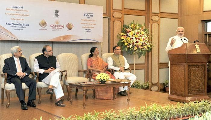 PM Narendra Modi launches gold schemes; coin with Ashok Chakra, Gandhi image