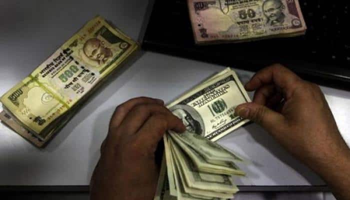 Rupee ends 26 paise down at 65.75 against USD