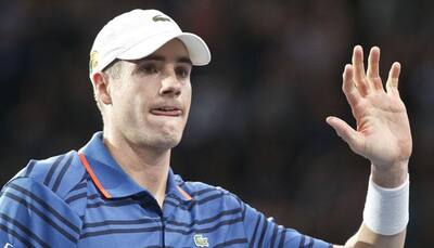 Paris Masters: John Isner stuns Roger Federer