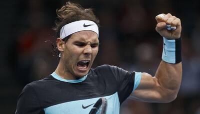 Rafael Nadal saves match point in comeback win at Paris Masters