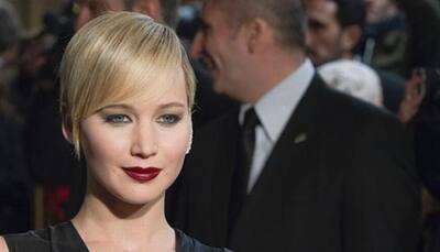 Jennifer Lawrence kisses 'Hunger Games' co-star