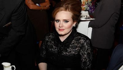 Adele gets emotional over her music