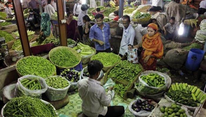 Inflation edges up at (-)3.81% in October; pulses, onion expensive