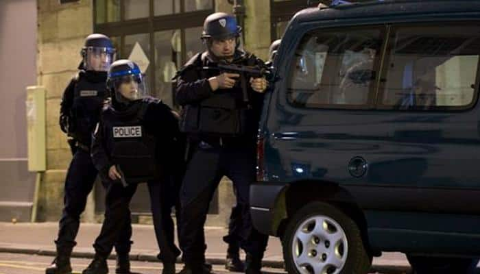 France stages 128 raids overnight after Paris attacks