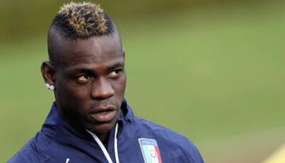 AC Milan's Mario Balotelli out for a month post operation